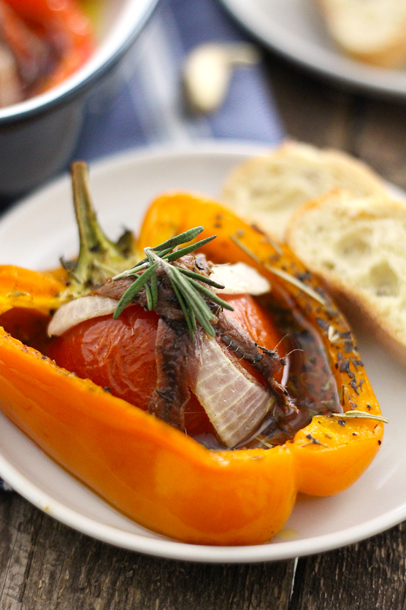 Tomato Garlic Stuffed Peppers are mouthwatering and packed with tomato, garlic, onion and lots of herbs and topped with sardines!