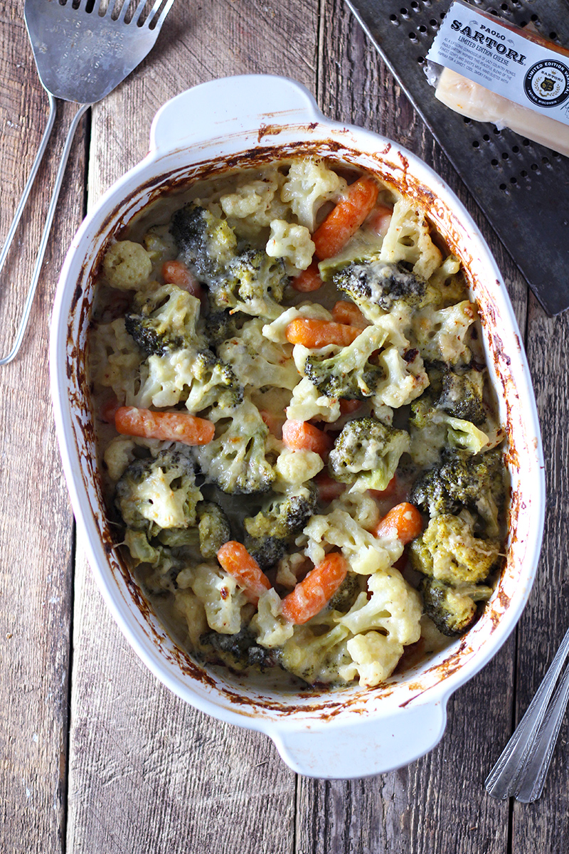 Creamy vegetable bake packed with carrots, broccoli, cauliflower, and lots of cheese!