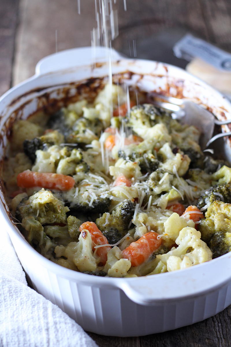 Creamy vegetable bake packed with carrots, broccoli, cauliflower, and lots of cheese!