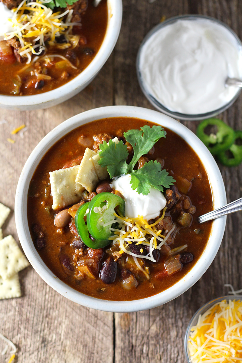 Hearty, easy-to-make chili with a kick! Loaded with five kinds of peppers from sweet to spicy, made with a full can of beer and homemade chili seasoning, and packed with beef and 4 kinds of beans. 