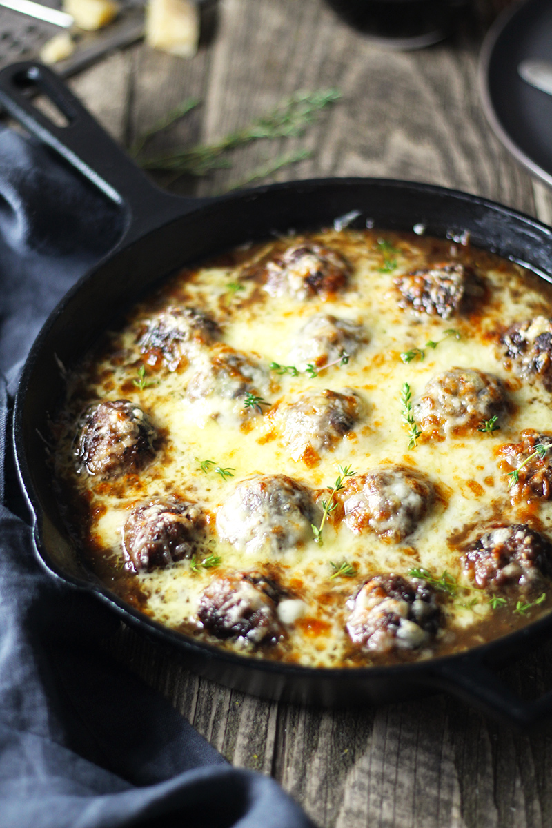 French Onion Cheese Stuffed Meatballs are the perfect alternative to soup, and made in just one skillet! Meatballs stuffed with Swiss cheese and smothered in perfectly caramelized onion and red wine gravy.