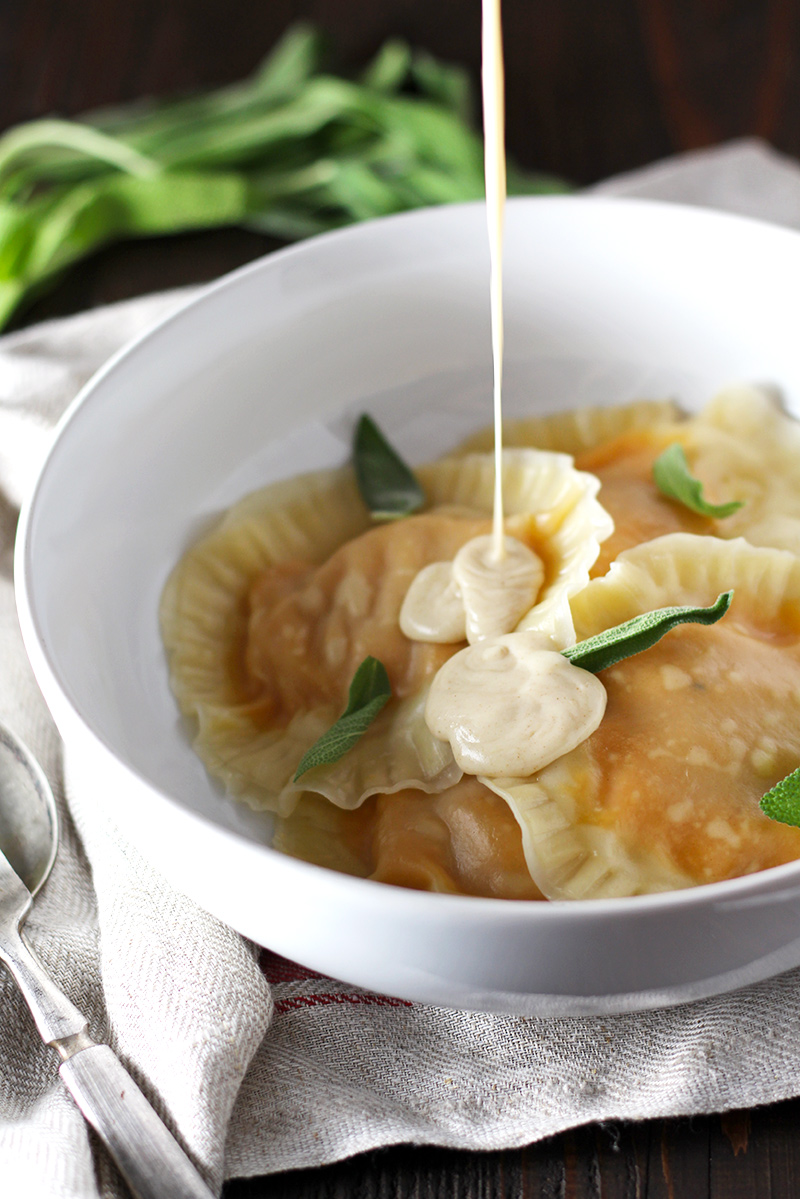 Butternut squash ravioli made super easy with wonton wrappers! Served with creamy and sweet brown butter sage sauce and homemade candied walnuts.