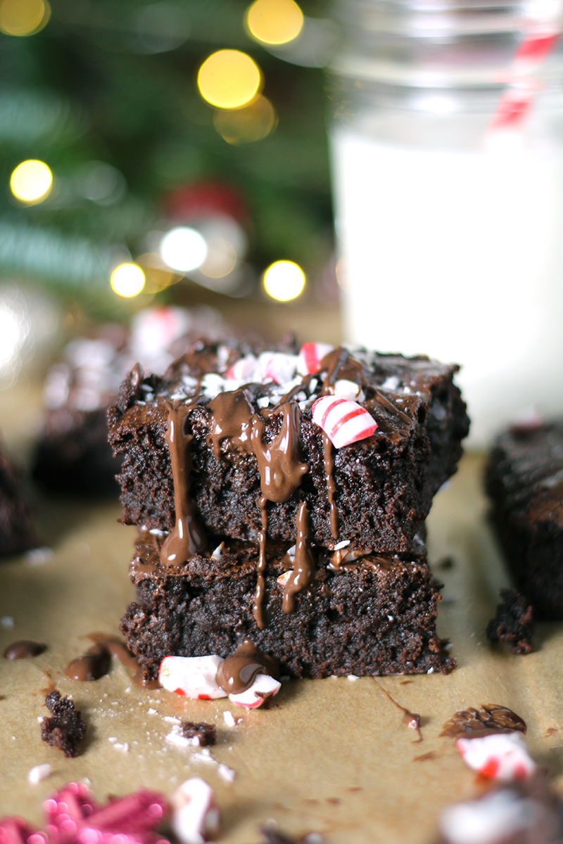 Fudgy Peppermint Mocha Brownies are the ultimate holiday treat! Rich and fudgy brownies infused with peppermint and espresso, drizzled with dark chocolate, and sprinkled with crushed peppermint candies.