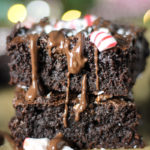 Fudgy Peppermint Mocha Brownies are the ultimate holiday treat! Rich and fudgy brownies infused with peppermint and espresso, drizzled with dark chocolate, and sprinkled with crushed peppermint candies.