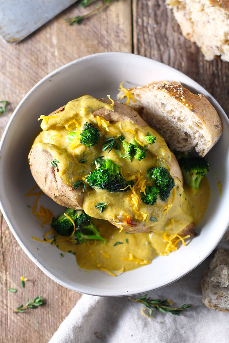 Broccoli Cheddar Soup Sweet Potato Bowls are what I like to call healthy, comfort food. Creamy, cheesy and from-scratch broccoli cheddar soup poured over white sweet potatoes that are packed with all the nutrients. Delicious for dinner or lunch meal-prep.