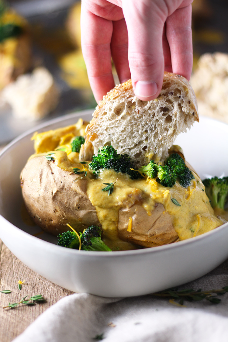 Broccoli Cheddar Soup Sweet Potato Bowls are what I like to call healthy, comfort food. Creamy, cheesy and from-scratch broccoli cheddar soup poured over white sweet potatoes that are packed with all the nutrients. Delicious for dinner or lunch meal-prep.