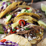 Mexican Pork Carnitas Tacos with Spicy Pineapple Slaw combines all the best flavors. The slow-cooked carnitas are smoky, delicious, and perfectly crisp, and the spicy pineapple slaw adds the perfect amount of spice and sweetness to the tacos.