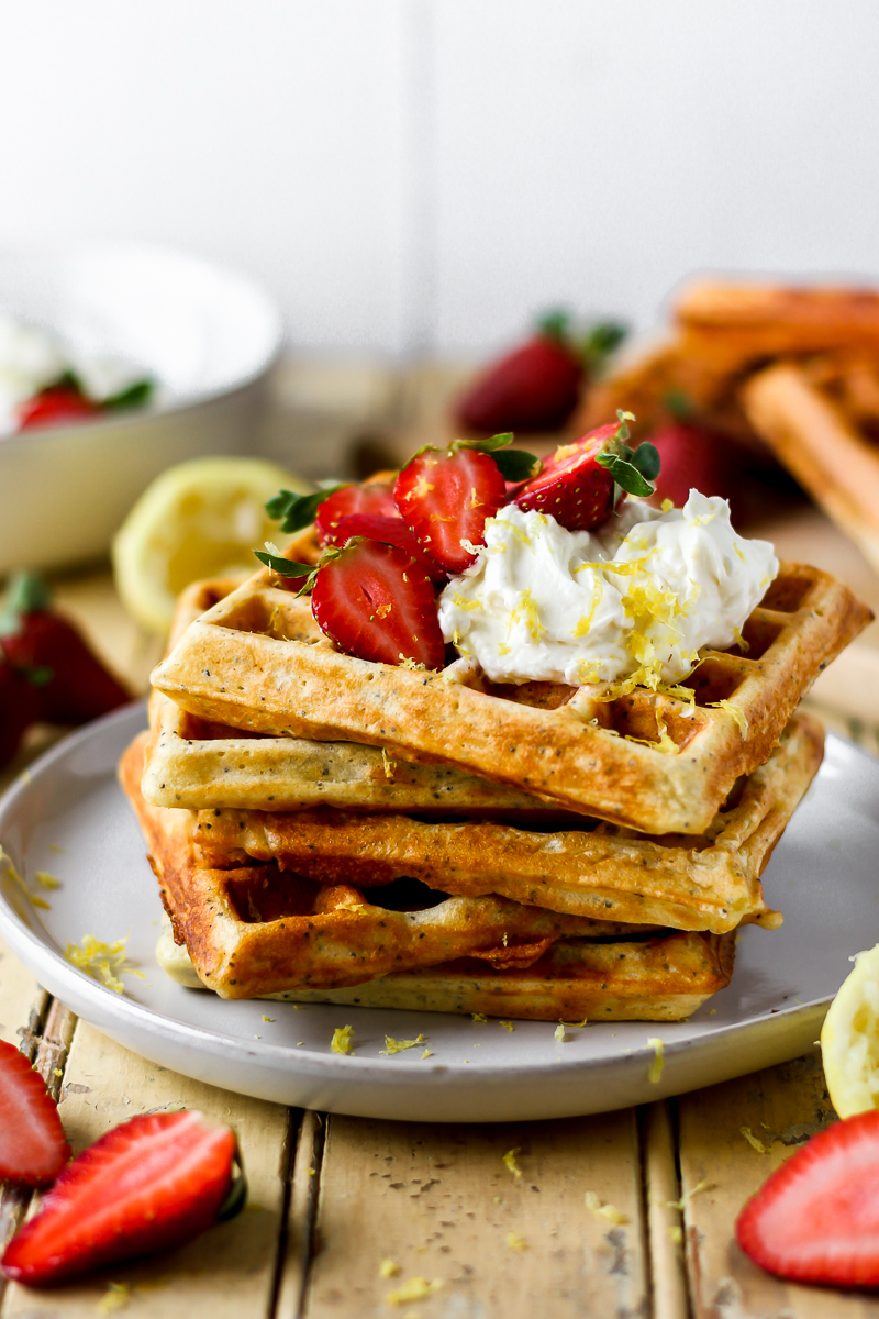 Fluffy on the inside and crisp on the outside, these lemon poppy seed waffles are a definite crowd pleaser! Topped with whipped honey lemon cream that’s bursting with fresh lemon flavor and just the right touch of sweetness. These waffles are like summer in your mouth.