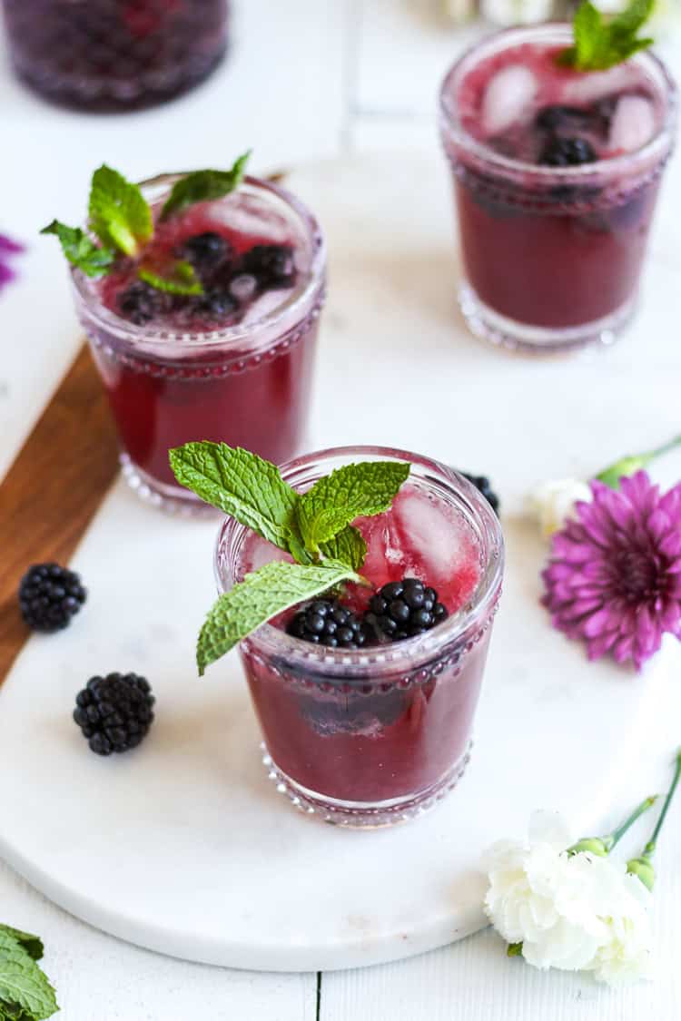 Your new drink of spring and summer! Easy, homemade blackberry ginger simple syrup pairs with lime, vodka and Prosecco creating a tasty and refreshing cocktail that’s perfect for brunch, parties or just any that requires a drink or two. 