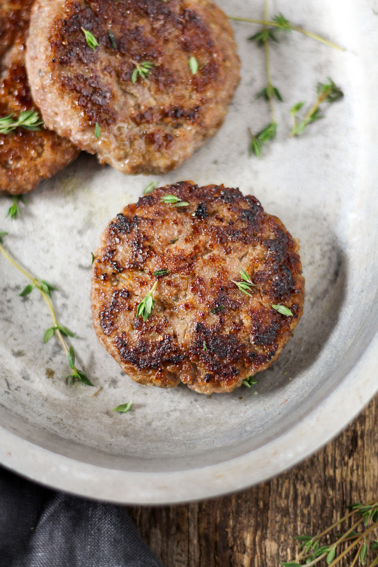 Maple Sage Breakfast Sausage is better than any breakfast sausage you can buy at the store! It’s super easy to make and uses real ingredients you can feel good about eating. You just need ground pork, real maple syrup, and seasoning that you likely already have in your kitchen.