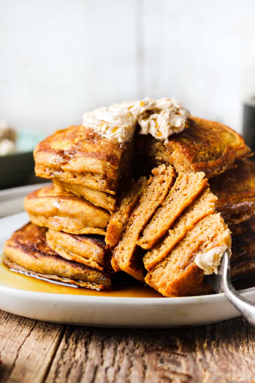 Fluffy pumpkin pancakes with cinnamon honey butter