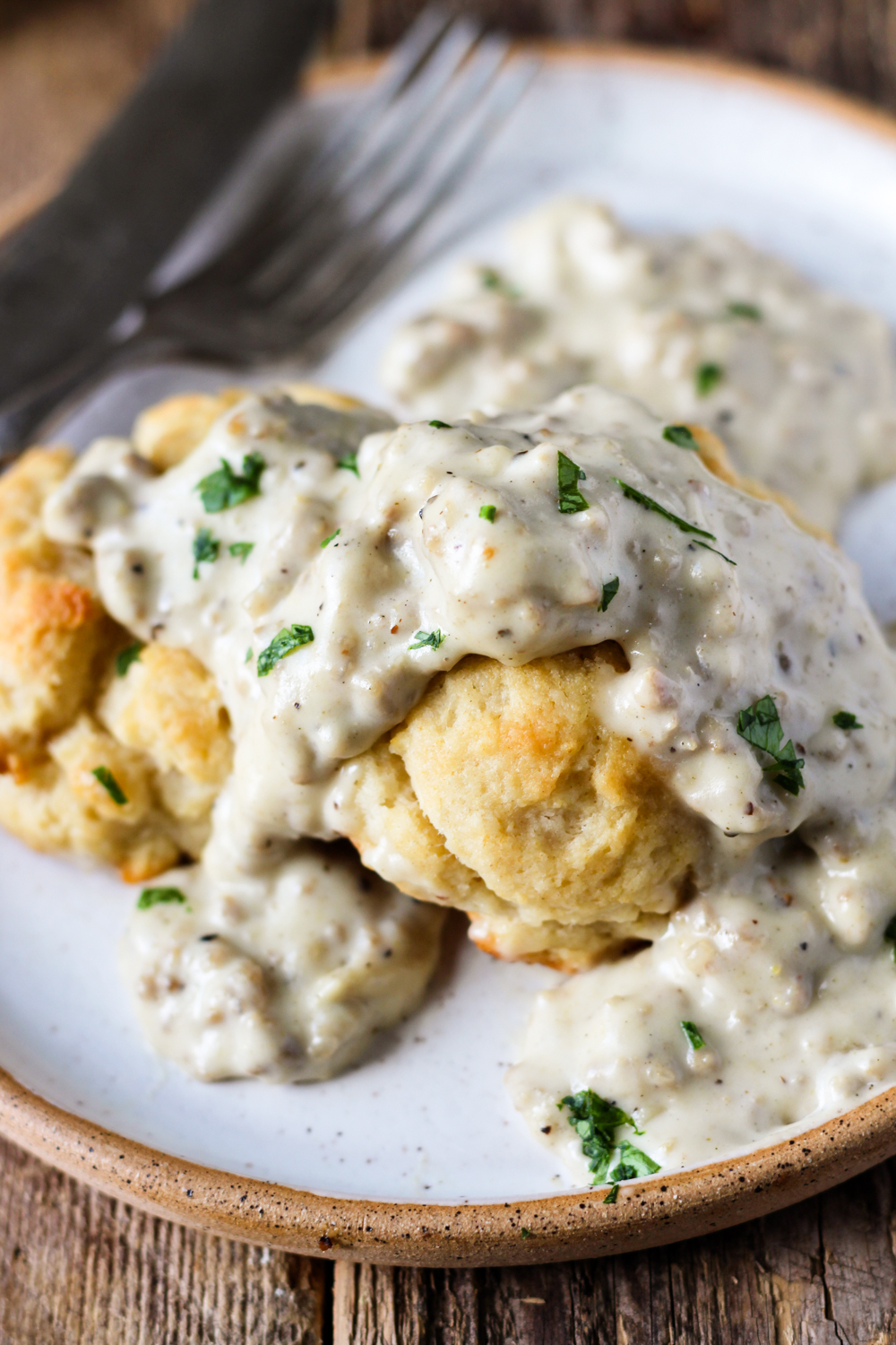 homemade biscuits topped with country sausage gravy