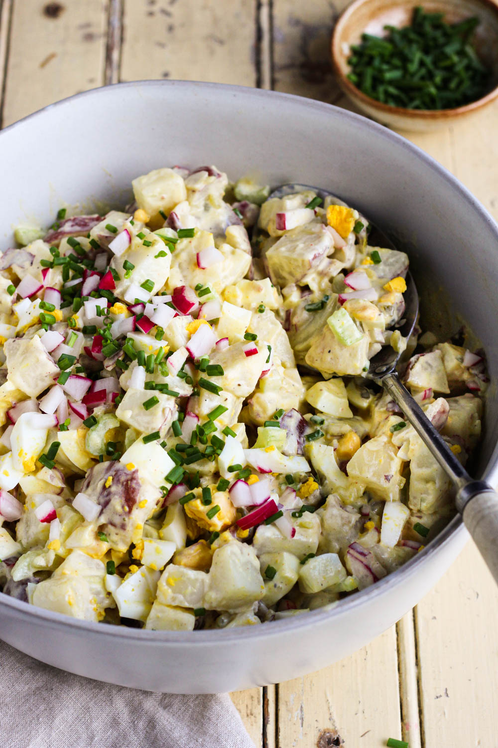 Scooping potato salad