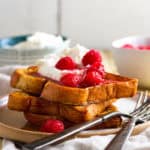 Cinnamon french toast with sugared raspberries and whipped lemon cream