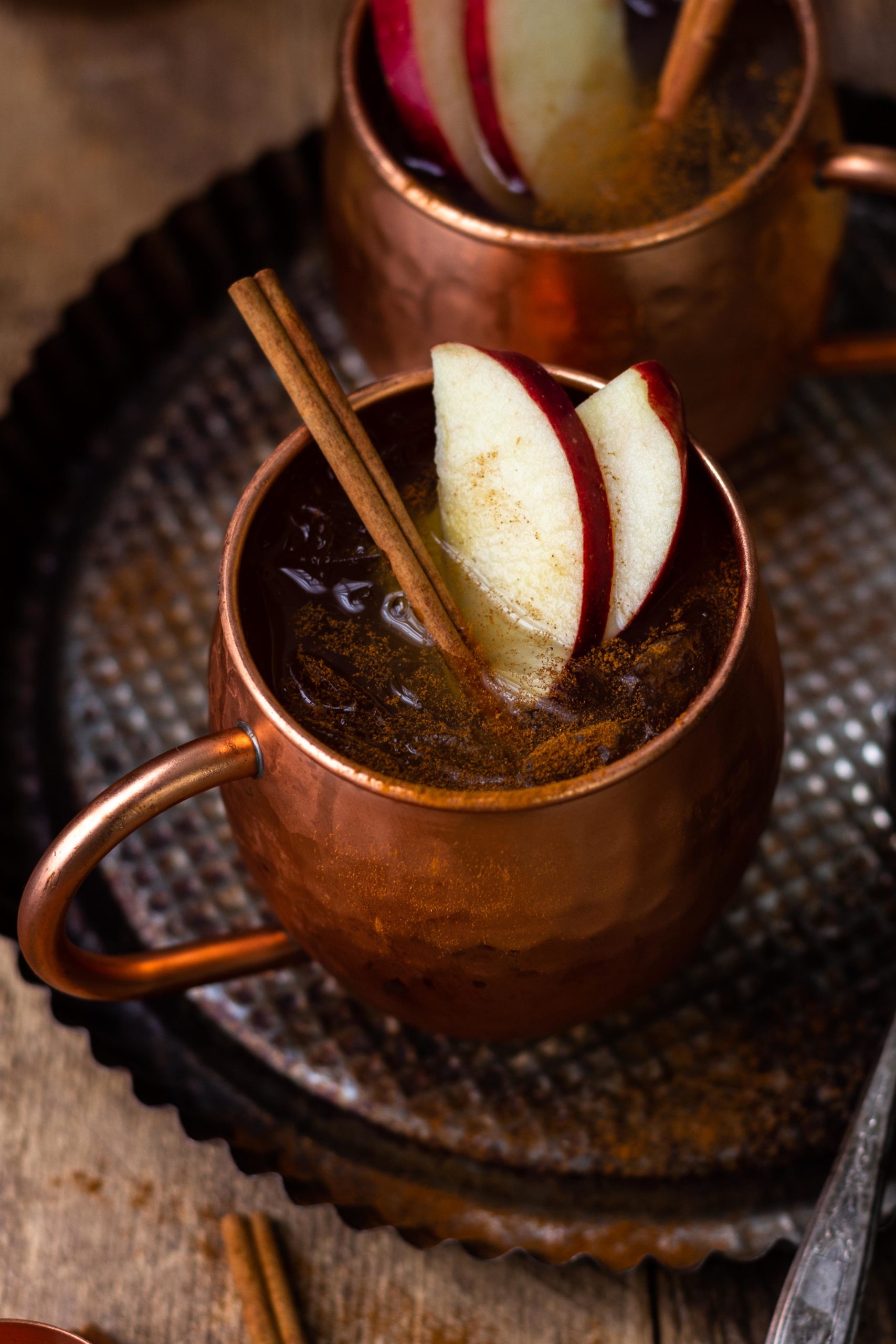 spiced apple cider moscow mule in copper mug
