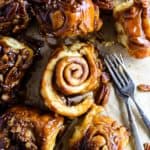 The MOST fluffy, soft, and delicious Caramel Pecan Sticky Buns! Homemade dough sprinkled with cinnamon sugar and baked in gooey caramel pecan sauce. This recipe includes the option to make them overnight so they’re warm and fresh for breakfast.