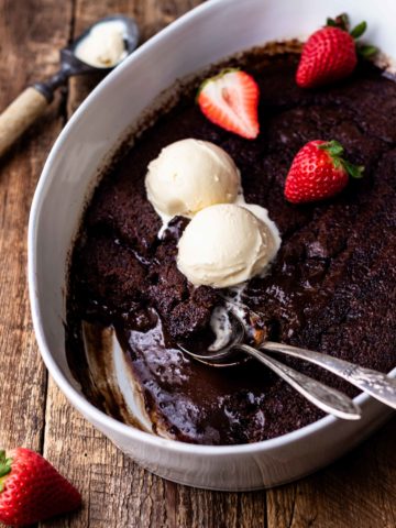 Super easy, self-saucing chocolate pudding cake! The perfect amount of sweetness. While baking, this dessert separates into a layer of delicious chocolate cake over the top of rich, hot fudge pudding. This pudding cake is sure to impress! Serve with vanilla ice cream for the best chocolate dessert!