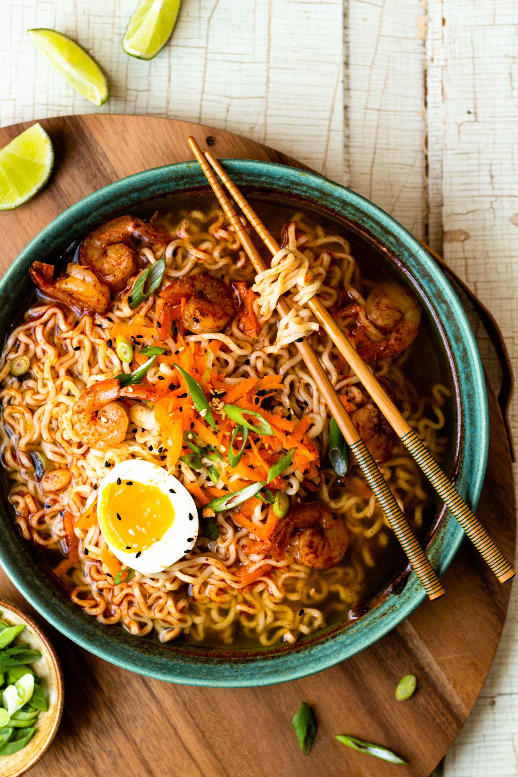 Homemade ramen noodle soup that is all made in one pot and ready in 30 minutes. Made with delicious chili lime seasoned broth, shrimp and lots of ramen noodles. A little spicy and so so good!!