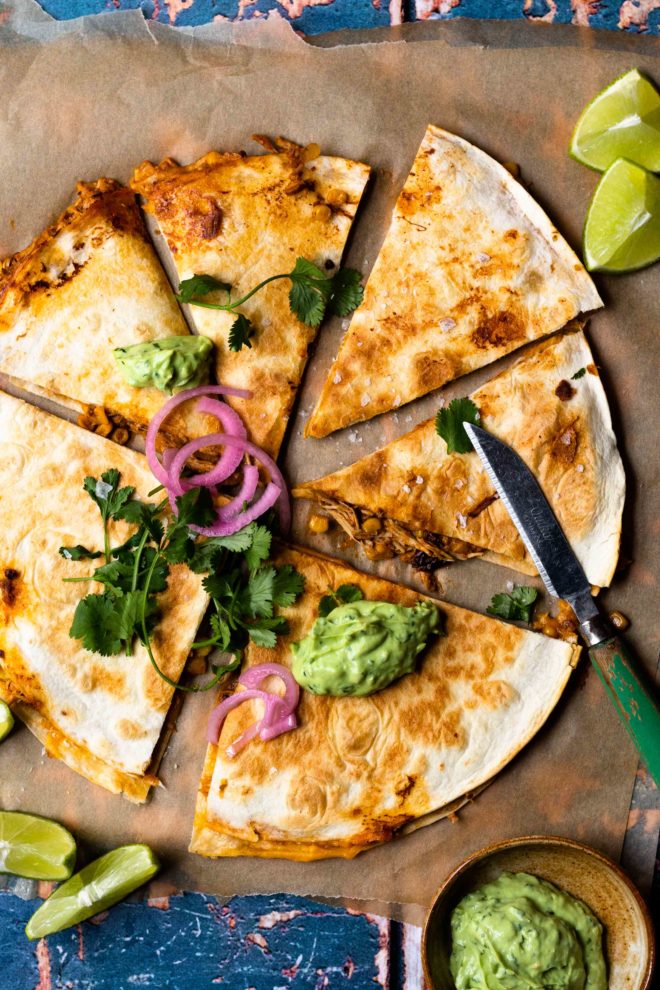 Easy to make and insanely flavorful chipotle chicken, sweet corn, and cheddar cheese tucked between two flour tortillas and grilled to golden, melty perfection. Top with the most delicious, creamy Avocado Lime Crema and lots of fresh garnishes!