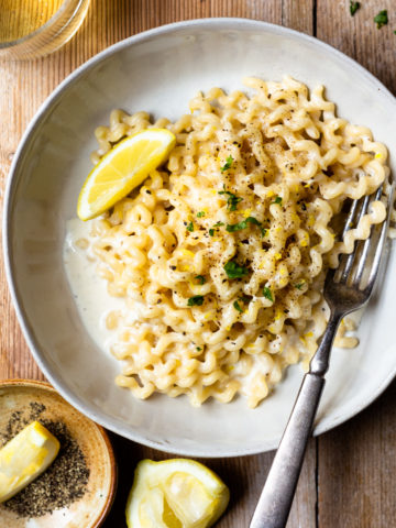 Lemon pepper pasta is so silky smooth and bursting with flavor! The sauce is light but creamy and only takes 20 minutes to prepare! The pasta can be served as a main dish or a side. It would be great with grilled chicken or fish! So simple and so delicious!!