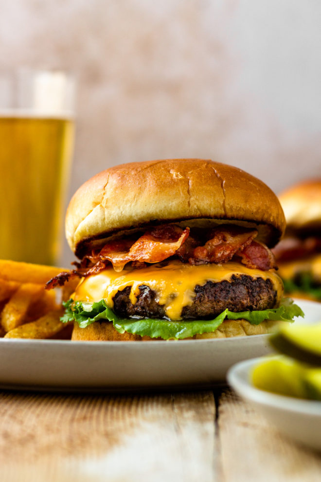 Crazy good burgers! Insanely juicy and flavorful burgers that are dripping with butter, smothered in melty cheese, and tucked between buttery, toasted buns.