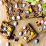 Crispy around the edges and chewy, gooey and buttery on the inside! Chocolate Easter Egg Cookie Bars are an easy to make, fun Easter treat that are studded with Cadbury Milk Chocolate Mini Eggs! These cookie bars are also a good way to use up any leftover chocolate Easter candy! Just add some of your favorite candy to the dough, such as M&M's or chocolate caramels! So so good!