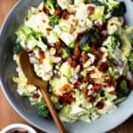 Easy and delicious side salad packed with veggies, bacon, grapes and almonds, then drizzled with a homemade sweet creamy dressing. Both adults and kids devour this salad! It’s perfect for a BBQ or quick weeknight side dish.