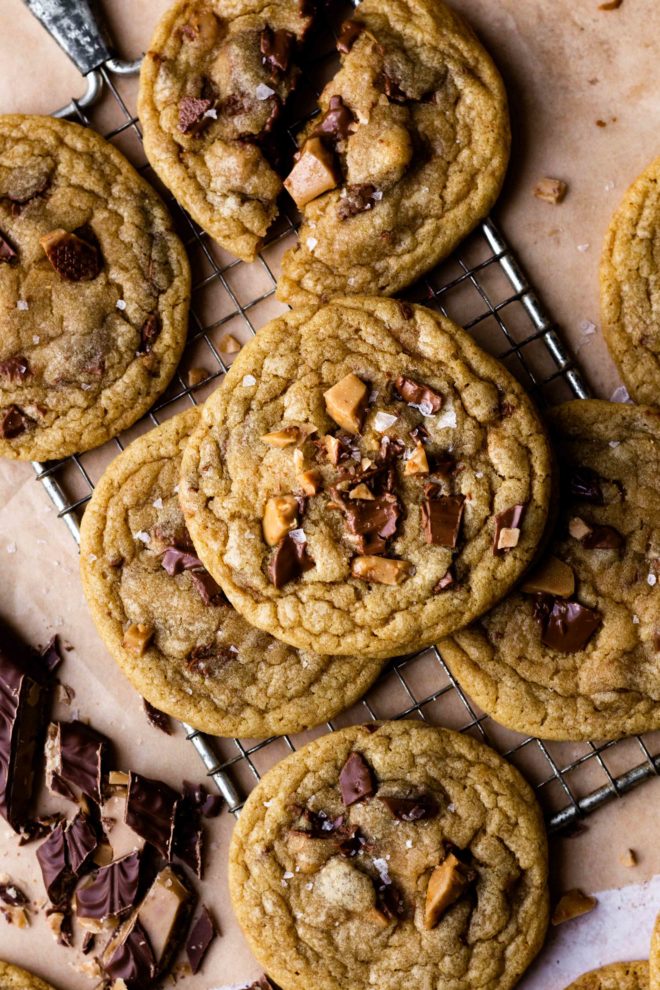 Brown Butter Heath Bar Cookies are incredibly delicious and addicting! They are so chewy, buttery and soft with chunks of chocolatey, English toffee Heath bar in every bite! Easy to make brown butter enhances the flavor by bringing a nutty, caramel like flavor to the dough. These cookies are a must make!!