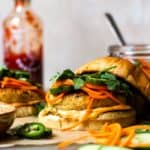 Crave worthy Chicken Banh Mi Burgers that are made with juicy, tender, perfectly seasoned ground chicken and sandwiched between toasted buns then spread with spicy sriracha mayo and topped with crunchy, tangy, quick pickled cucumber, carrot and jalapeño. Finish with fresh cilantro, if desired. The perfect combination!