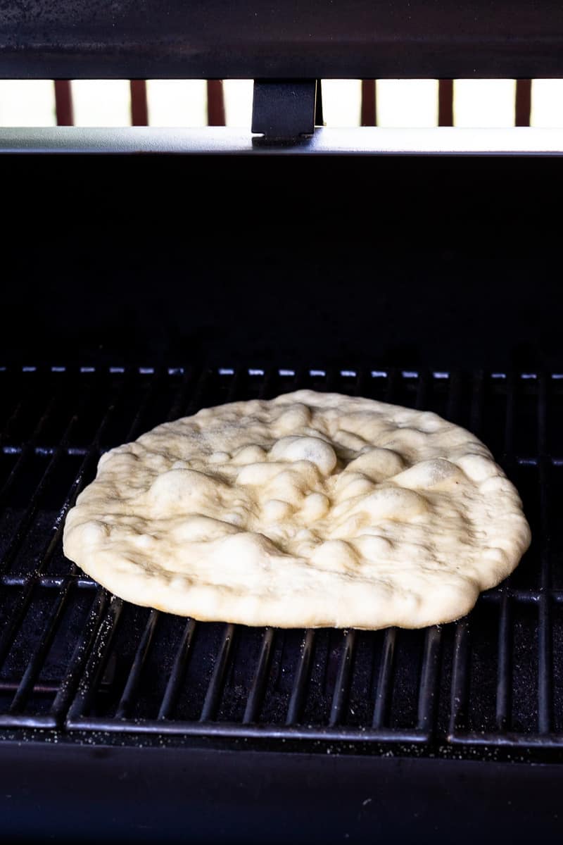 pizza dough on the grill