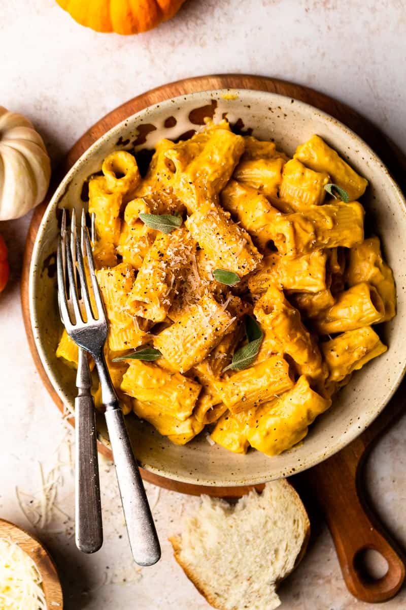 pumpkin pasta in a bowl with parmesan cheese