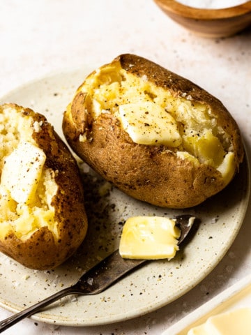 russet baked potatoes with butter, salt and pepper