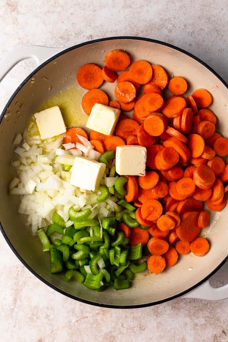 cooking vegetables and butter in a skillet