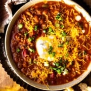 bowl of venison chili with beer