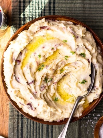 red skin mashed potatoes in a serving bowl