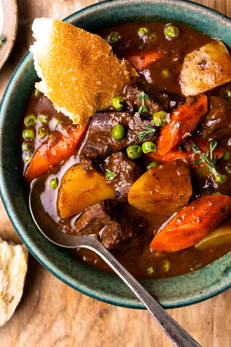 bowl of venison stew with bread