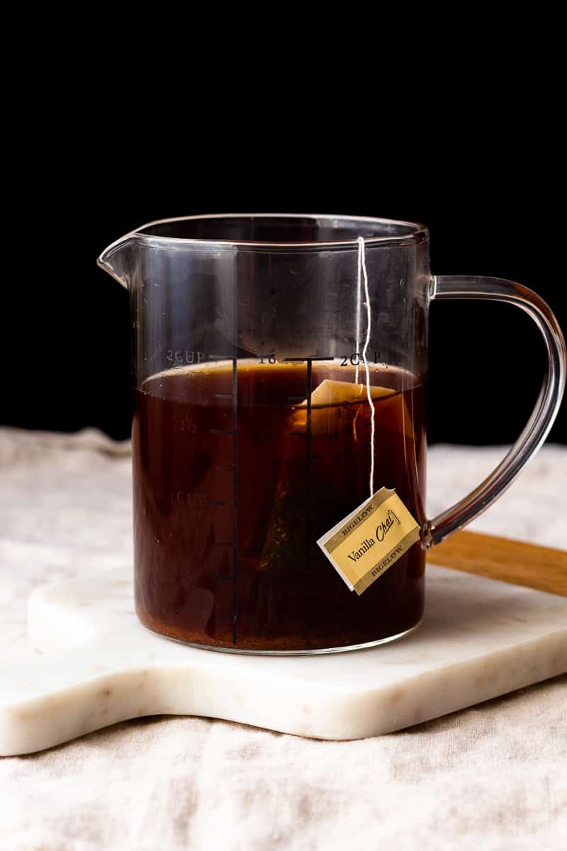 chai tea bag steeping in hot water