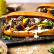 assembled Italian beef sandwich on a serving platter