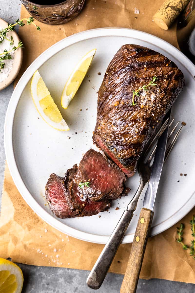 marinated venison backstrap on a plate