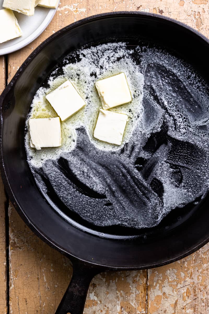 melting butter in a hot skillet