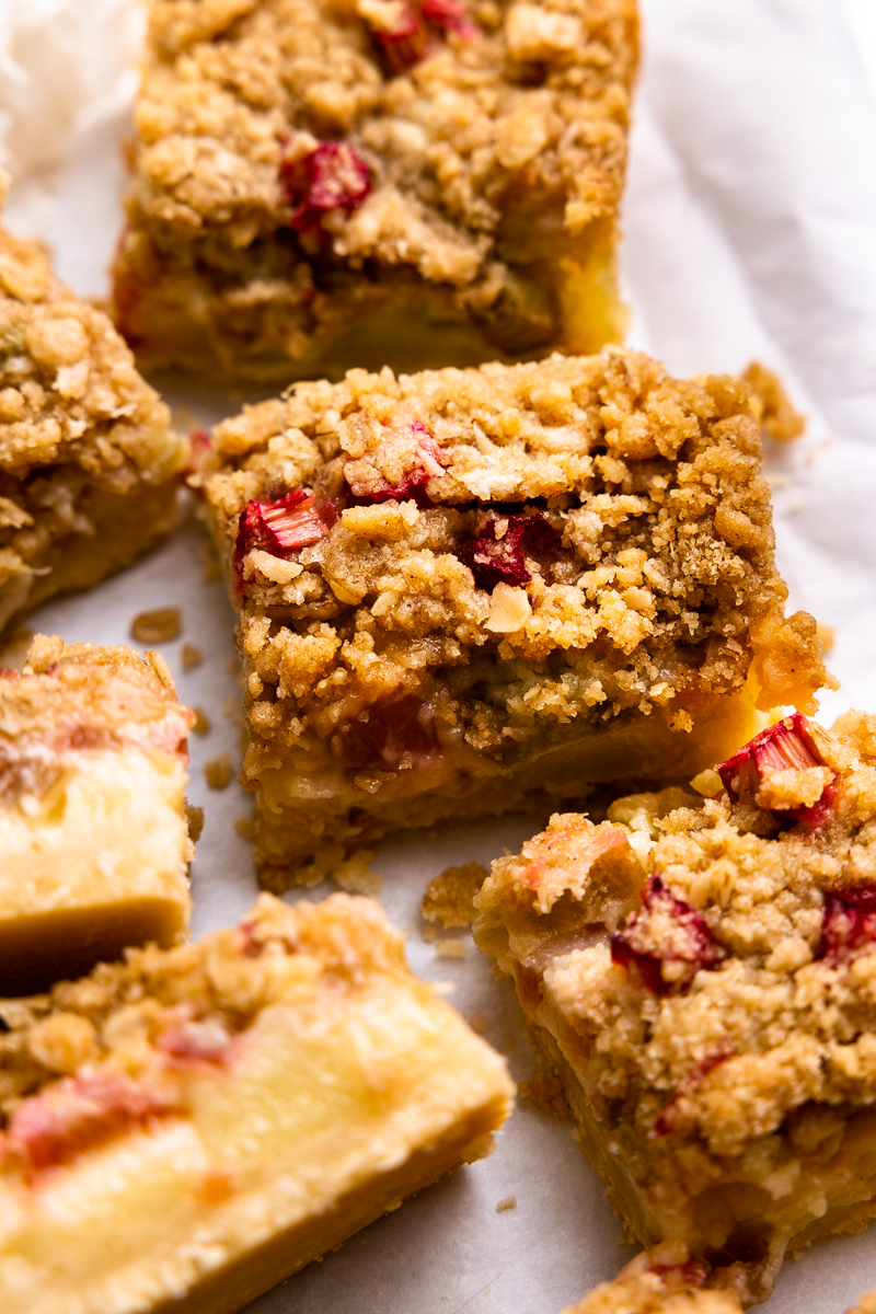 close up of rhubarb bars crumble topping