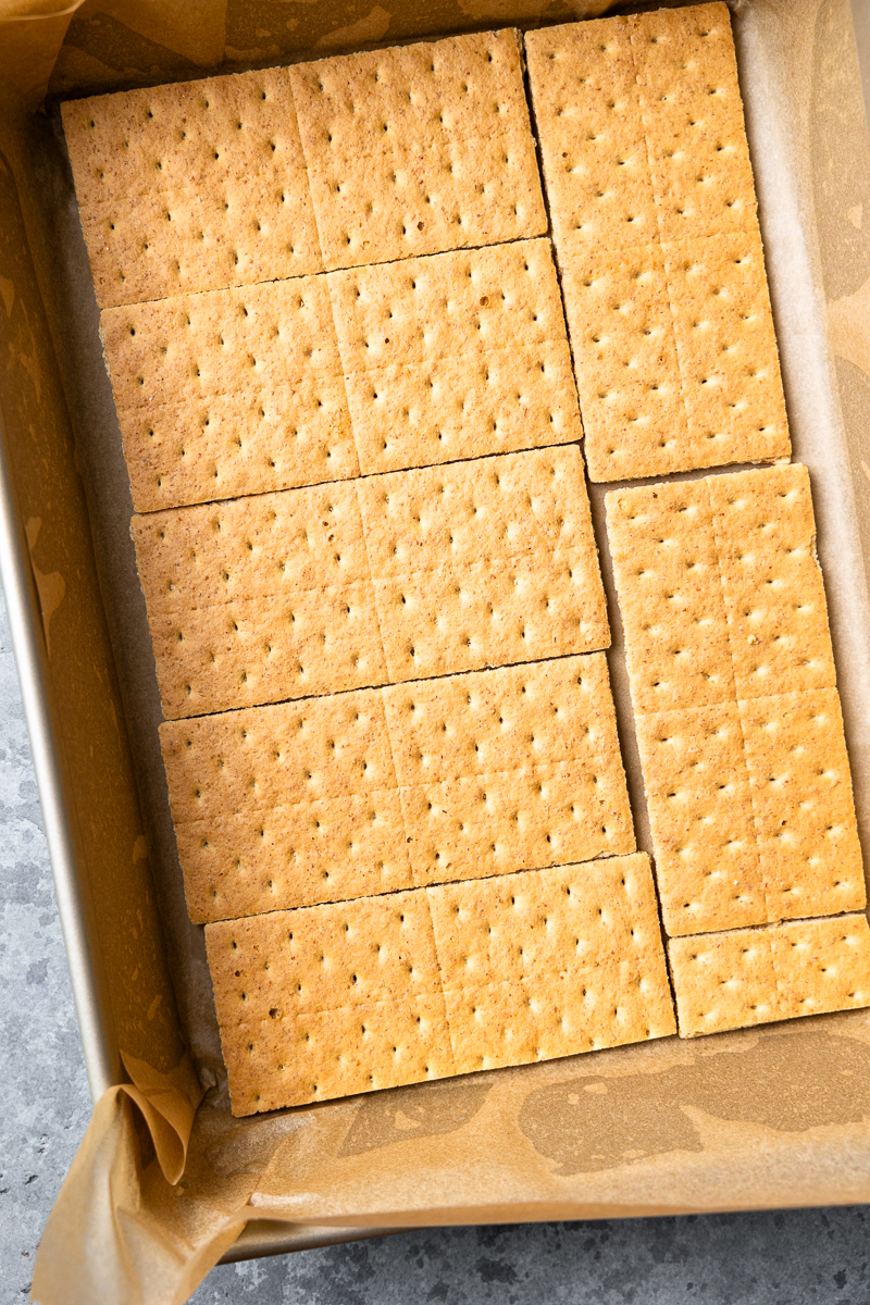 graham crackers in the bottom of a baking dish