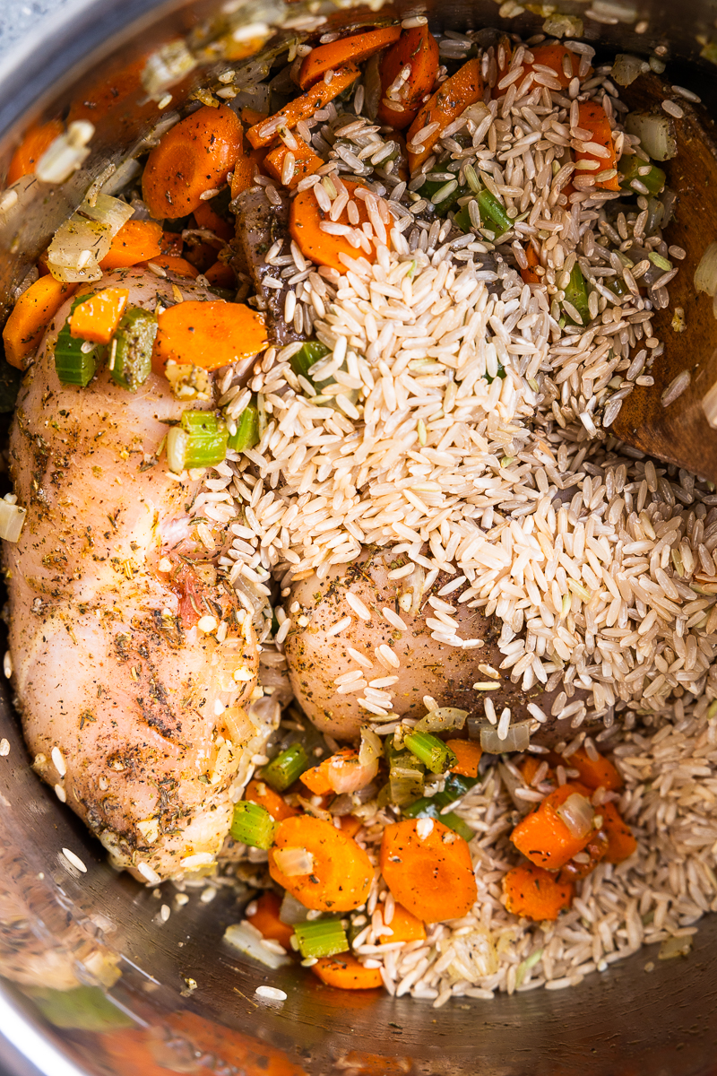 vegetables, chicken, seasoning and rice in the instant pot
