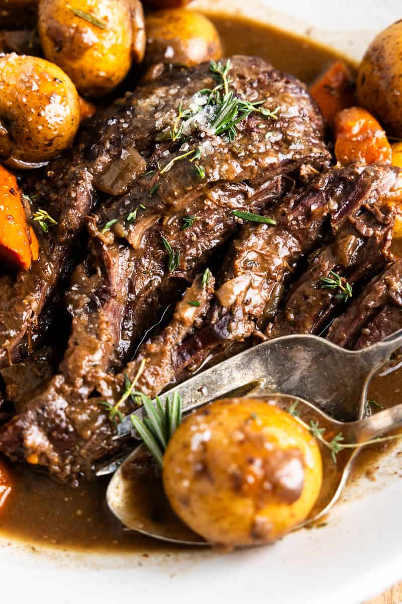 venison roast in a serving dish