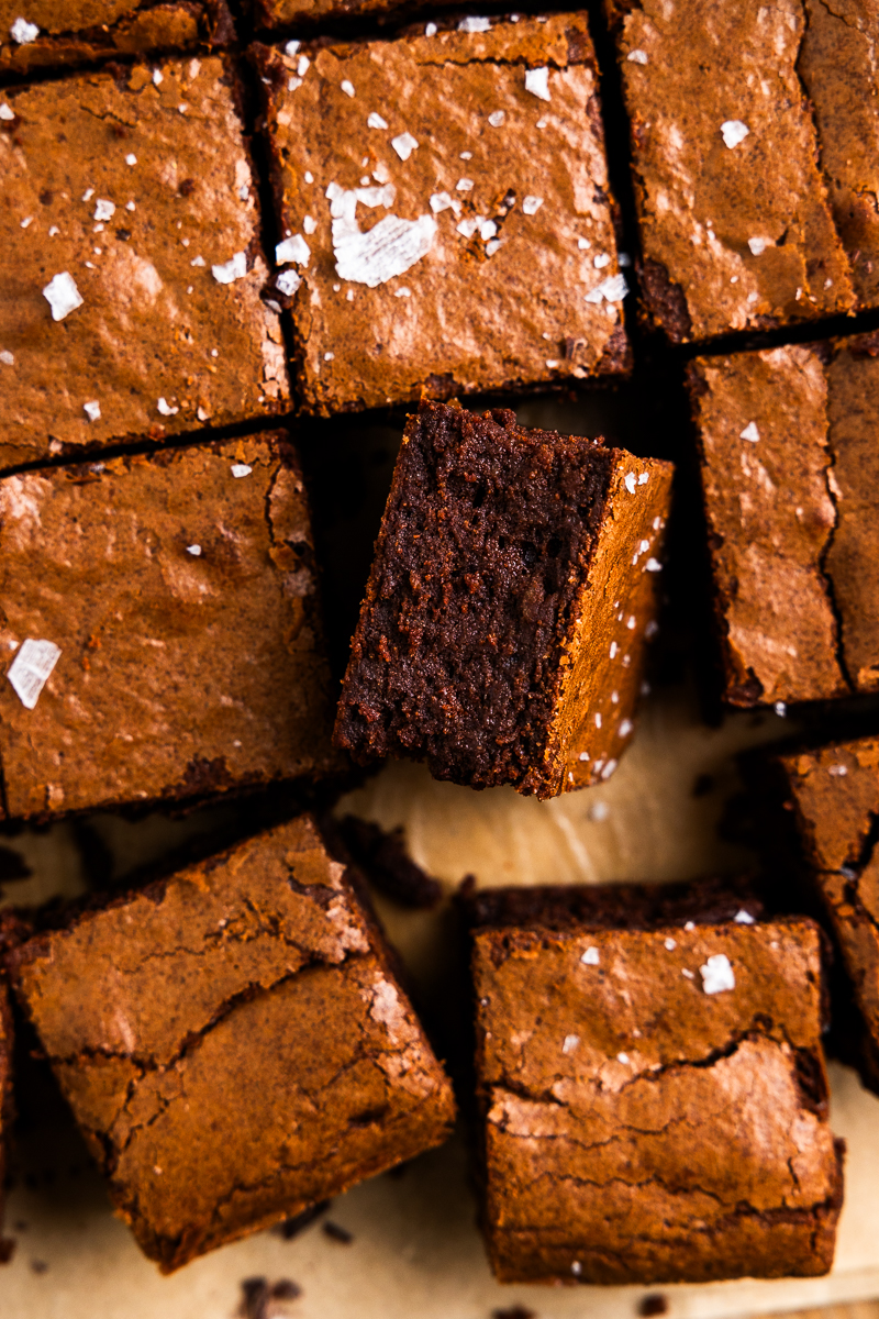close up of a brownie slice on its side