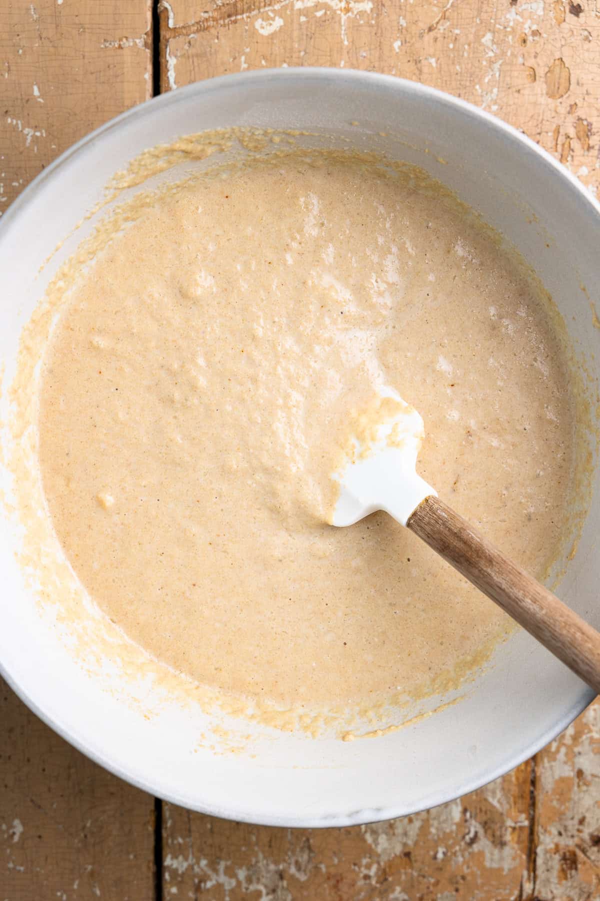 Fresh milled pancake batter mixed in a bowl.
