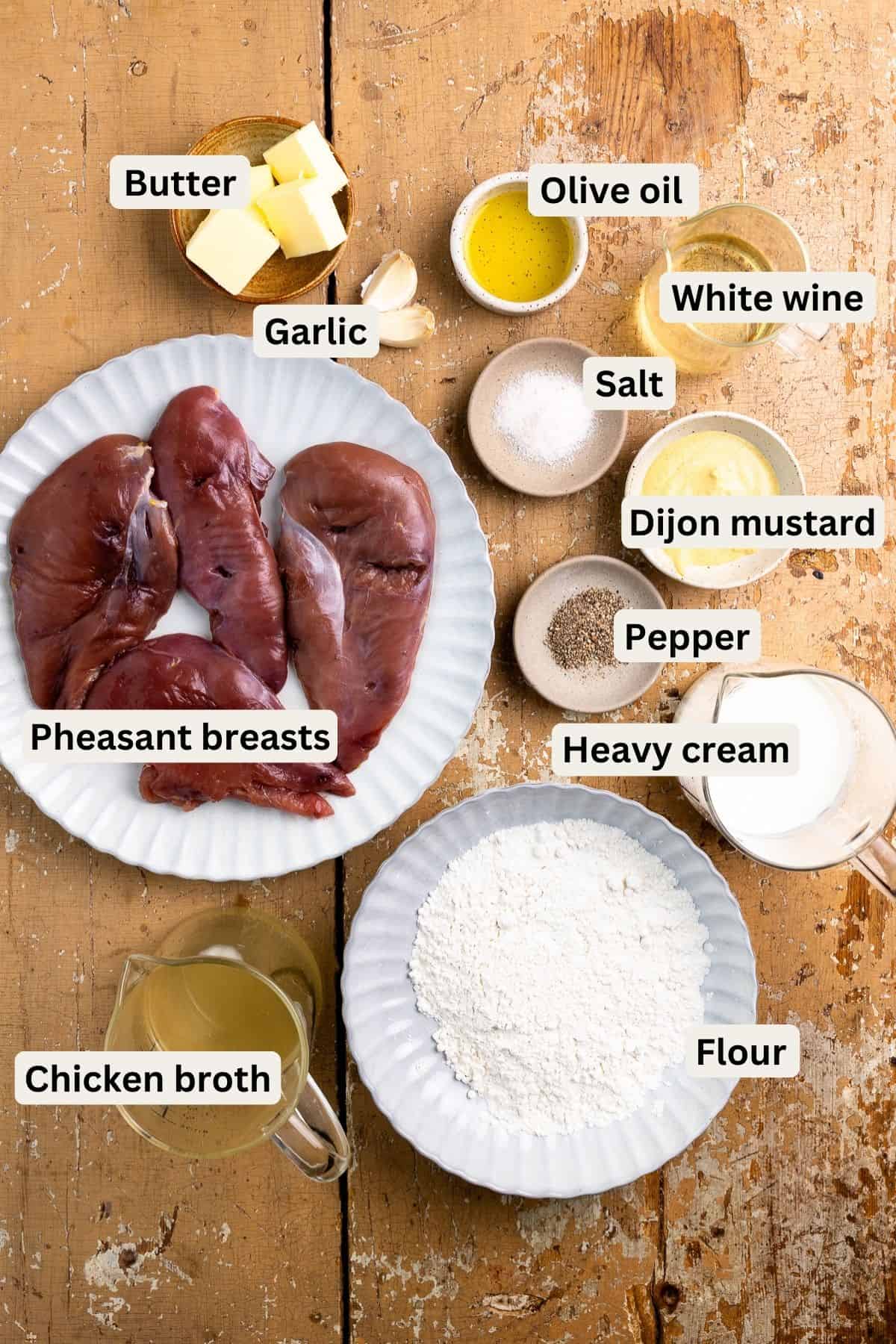 Ingredients for pan-seared pheasant with creamy dijon mustard sauce.