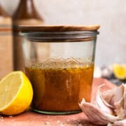 Venison marinade in a jar with a lid.