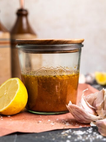 Venison marinade in a jar with a lid.